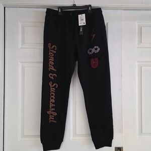 Roku Studio Black Joggers with Gold Star